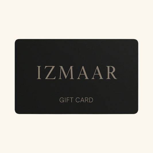 Black gift card with 'IZMAAR' branding on a beige background
